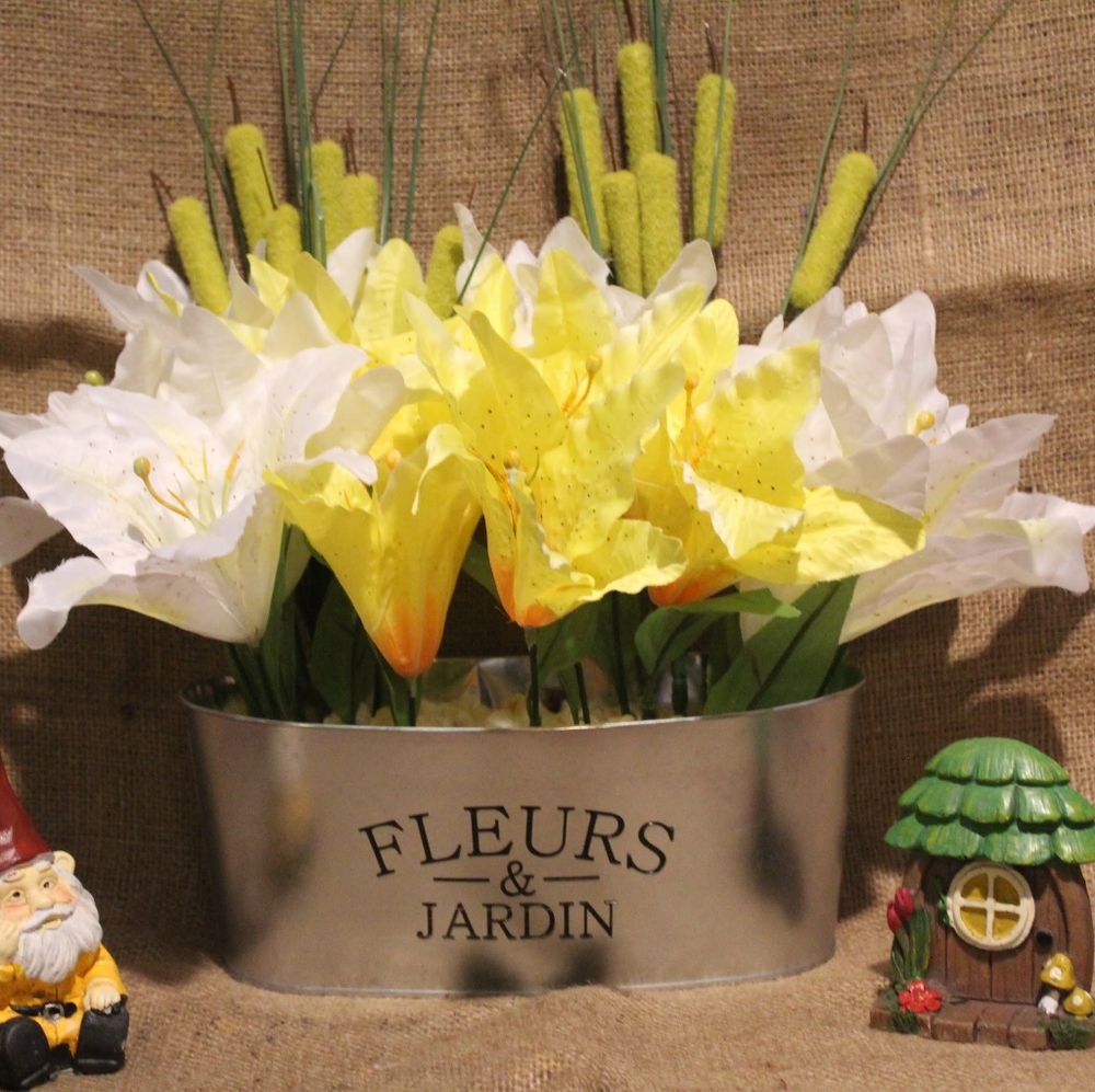 Homemade garden tub with artificial flowers